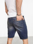 ASOS DESIGN slim mid length denim shorts in y2k wash