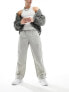 Фото #1 товара ASOS DESIGN baggy nylon track pants with contrast piping in stone