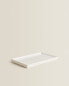 White earthenware bathroom tray