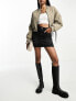 Фото #4 товара ASOS DESIGN Tall denim high waist mini skirt in black