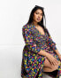 ASOS DESIGN Curve midi smock dress with shirred cuffs in black based multi floral print