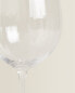 Raised crystalline wine glass