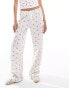 Фото #2 товара ASOS DESIGN strawberry ditsy wide leg trousers in white