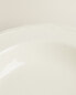 Earthenware soup plate with raised-design edge