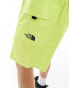 The North Face logo pocket shorts in lime