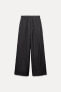 Creased-effect palazzo trousers