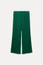 PLEATED TROUSERS