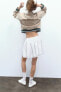 Voluminous double-layer mini skirt