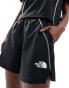 Фото #1 товара The North Face Training Hakuun contour seam woven shorts in black