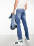 ASOS DESIGN slim jeans in mid wash blue