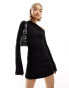 Weekday Erin long sleeve asymmetric shoulder mini dress with ruched sides in black