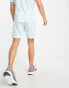 Puma Rise Football shorts in baby blue and orange