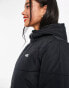 Vans Foundry long puffer jacket in black