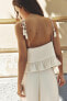 Rustic strappy top with tassels