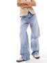 Фото #4 товара Stradivarius Petite wide leg dad jean with rips in medium wash blue
