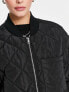 Edited maxi quilted bomber coat in black