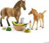 Фото #1 товара Figurka Schleich Zestaw pielęgnacyjny Quarter koń + źrebię (SLH 42432)