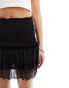 Фото #2 товара Monki smocked mini ruffle skirt in black