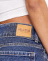 Hollister – Weite Vintage-Jeans in mittelblauer Waschung mit niedrigem Bund