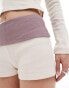 Reclaimed Vintage mini hot pant short with fold over waistband in cream