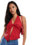 ASOS DESIGN textured halter twist front top in red