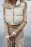 Cropped rubberised gilet
