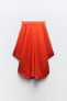 Asymmetric pleated skirt