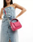 DKNY Arden top handle bag with cross body strap in pink croc