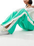 Фото #5 товара Nike Air mid rise break away woven trousers in spring green