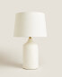Table lamp with white ceramic base
