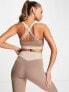 Pink Soda cross back light support sports bra in taupe