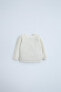 2-in-1 textured jacket sweater