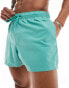 ASOS DESIGN swim shorts in short length in teal