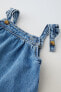 Denim pinafore dress and briefs co-ord