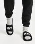 DKNY logo slider slippers in black