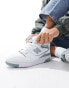 New Balance 550 trainers in white and sage