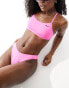 Nike Swimming Essential racerback bikini top in playful pink