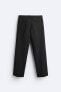 Trousers with contrast double waist