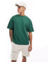 ASOS DESIGN oversized t-shirt in green with Berlin back print