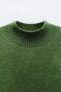 Plain wide ribbed knit sweater