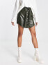 Фото #1 товара ASOS DESIGN faux leather button through mini skirt with belt in khaki