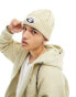 AAPE BY A BATHING APE® – Strickmütze in Beige mit Zopfmuster