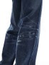 ASOS DESIGN baggy jeans with abrasions in dark blue wash