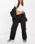 Фото #4 товара Pull&Bear low waist parachute tech pant in black