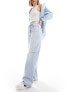 Stradivarius wide leg dad jean with rip in light wash blue