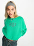 Nike – Oversize-Sweatshirt in Stadiumgrün mit kurzem Schnitt und College-Logo