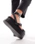 ASOS DESIGN Trombone chunky buckle detail flatforms in black