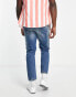 Фото #4 товара ASOS DESIGN tapered fit jean in tinted wash with knee rips - MBLUE