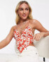 Sisters Of The Tribe halter neck top with handkerchief hem in floral