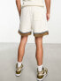 Фото #4 товара ASOS DESIGN oversized shorts in ecru towelling colour block with collegiate badging